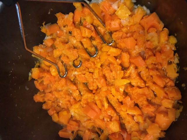 Hutspot Dutch, hochepot French or hotchpotch English, is a dish of boiled  and mashed potatoes, carrots and onions close up in the bowl on the table.  V Stock Photo - Alamy